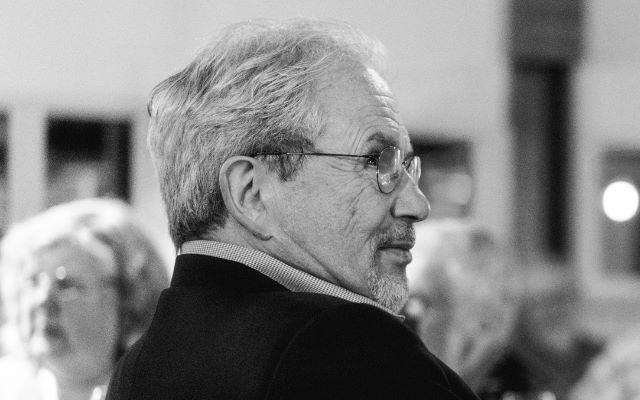 A man with glasses.