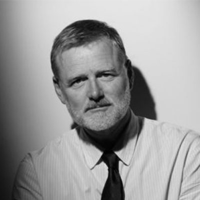 A bearded man in a tie