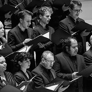 The Chorus of Opera North singing