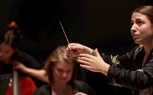 The young Finnish conductor Dalia Stasevska conducts the Orchestra of Opera North in Huddersfield Town Hall, April 2019
