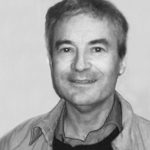 Black and white headshot of David Cowan