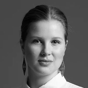 A woman wearing large earrings.
