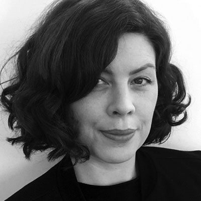 Black and white headshot of Hannah Clark