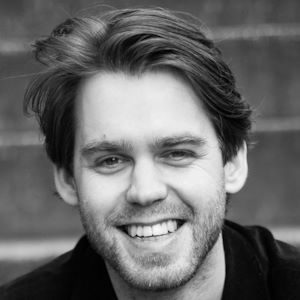 A man with wavy hair.