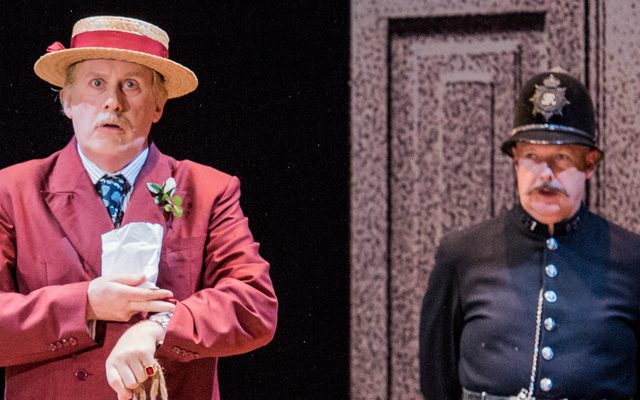 Jeremy Peaker as The Learned Judge with Amy Freston as The Plaintiff, in Opera North's 2017 production of Trial by Jury © Robert Workman
