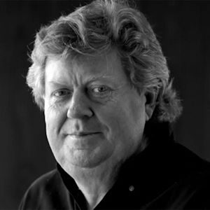 A man with thick wavy hair.