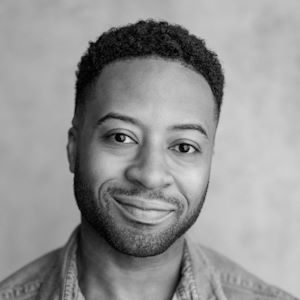 A smiling man.