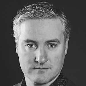 A man with short hair.