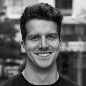 A man looking at the camera, smiling
