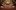 Panoramic view from the stage of the red, Victorian auditorium of Leeds Grand Theatre.