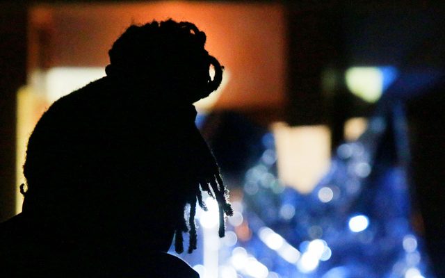 The artist Thabo in silhouette