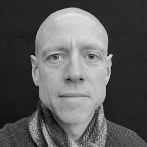 A picture of a man wearing a scarf