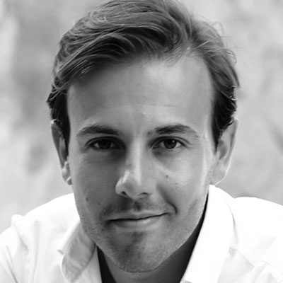 Black and white headshot of Nico Darmanin