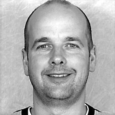 A bald man in a t-shirt.