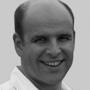 Sebastian Frost 300 x 300 A bald man wearing a white shirt.