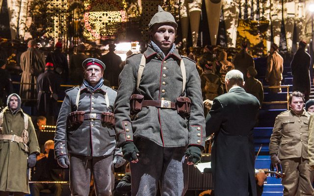 Members of the Chorus of Opera North as Scottish and German soldiers © Tristram Kenton