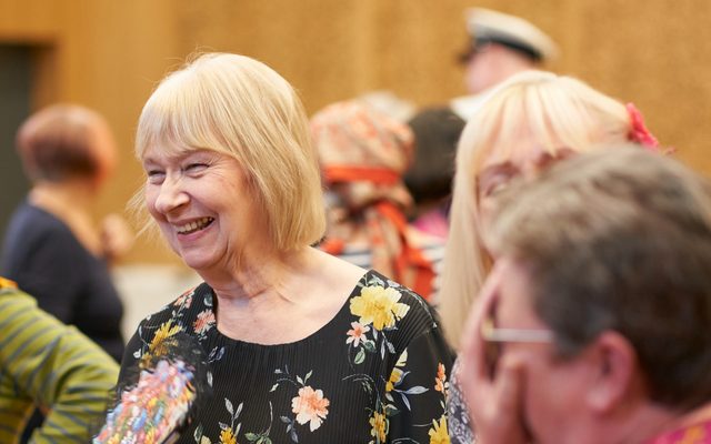 A group of ladies laughing together
