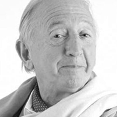 An older man with white hair.