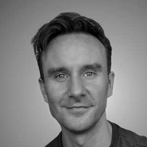 A man with short dark hair.