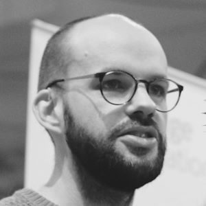 A man wearing glasses.