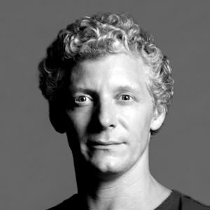 A man with curly hair.