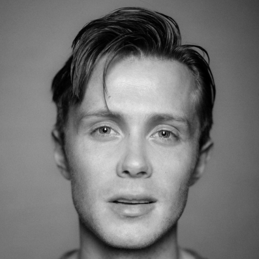 Rob-Houchen A man with short hair wearing a sweater.